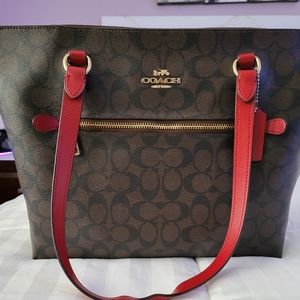 Brown and red coach purse